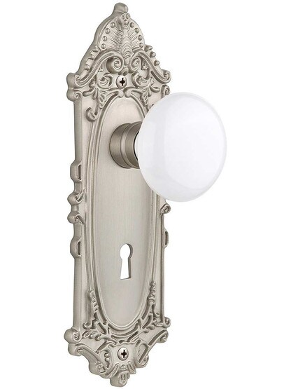 Largo Door Set with White Porcelain Knobs and Keyhole Single Dummy in Satin Nickel.